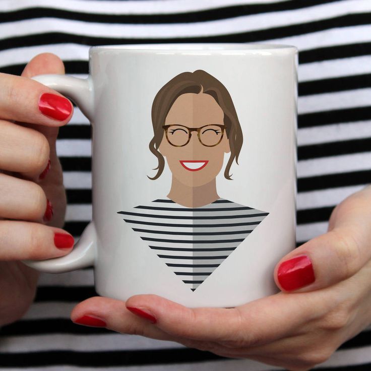 a woman is holding a coffee mug with her face on the front and bottom half