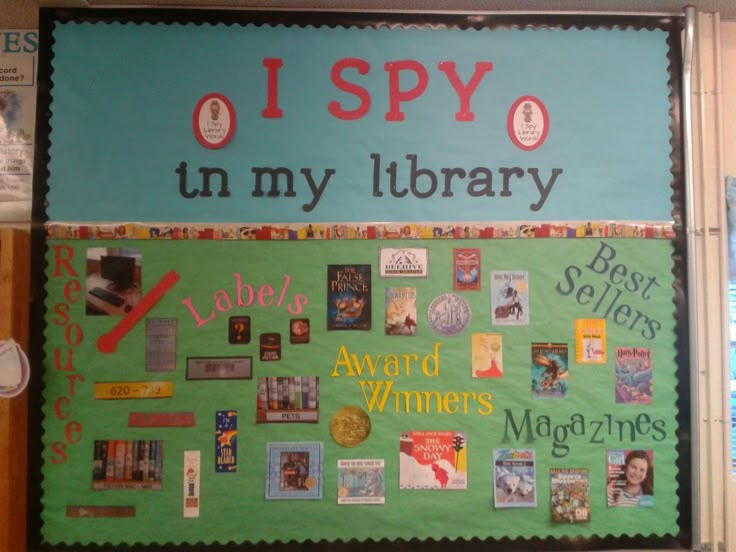 i spy in my library bulletin board with pictures and words on the front door for students to read