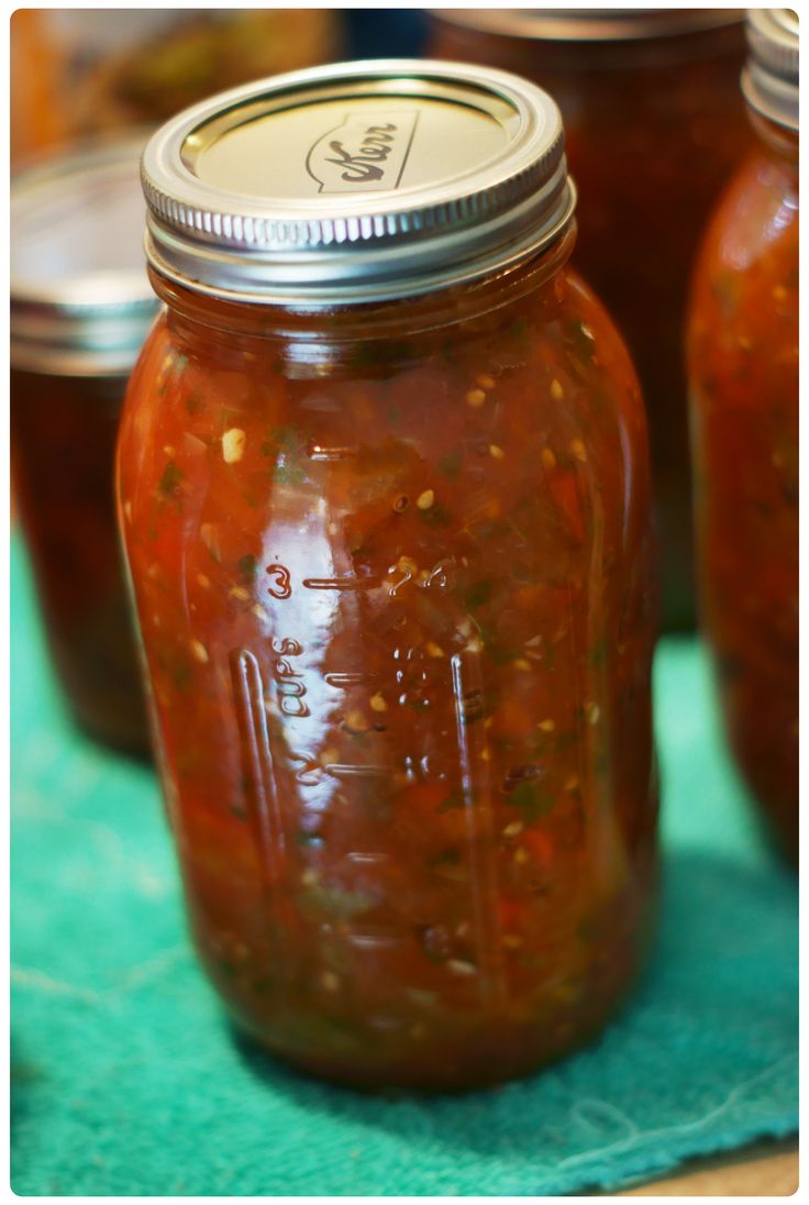 there are many jars of food on the table