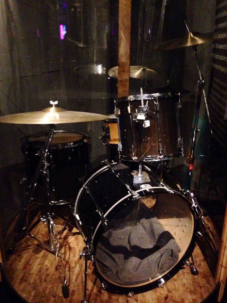 a drum set sitting on top of a wooden floor