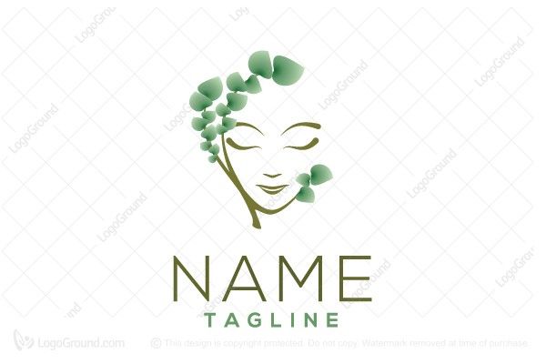 a woman's face with green leaves in her hair logo for sale on the internet