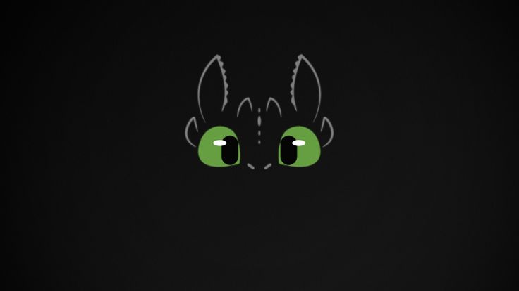 a black background with green eyes and an evil cat's head in the center