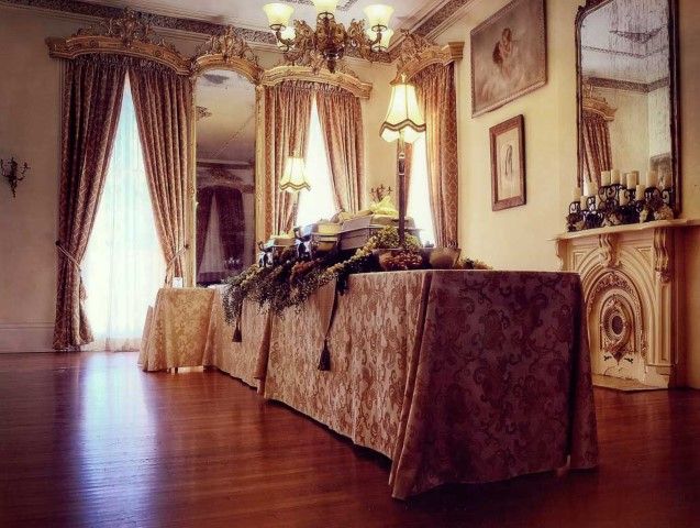 a dining room table is covered with cloths