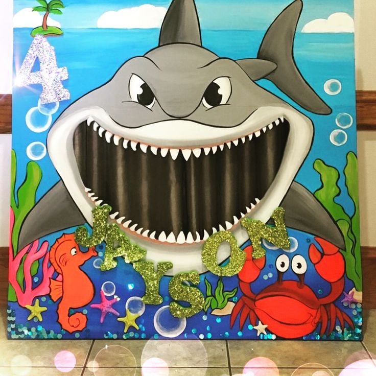 a painting of a shark with sea creatures on it's face and teeth, in front of a tile floor