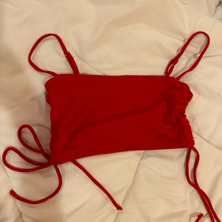 Never Worn Red Crop Top From Greece! Cute Bows On The Side! Small But Stretchy And Could Fit Xs Stretch Red Top For Beach Season, Stretch Red Tops For Beach Season, Trendy Red Tops For Beach, Fitted Red Crop Top For Beach, Red Summer Crop Top For Beach, Fitted Red Crop Top For Vacation, Red Crop Top For Summer, Trendy Red Crop Top For Vacation, Red Fitted Summer Crop Top