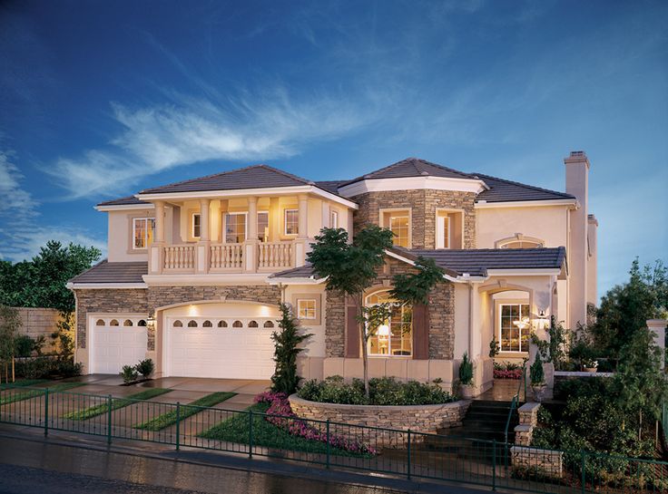 a large home is lit up at night