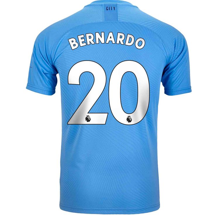 a soccer jersey with the number 20 on it, in light blue and white colors