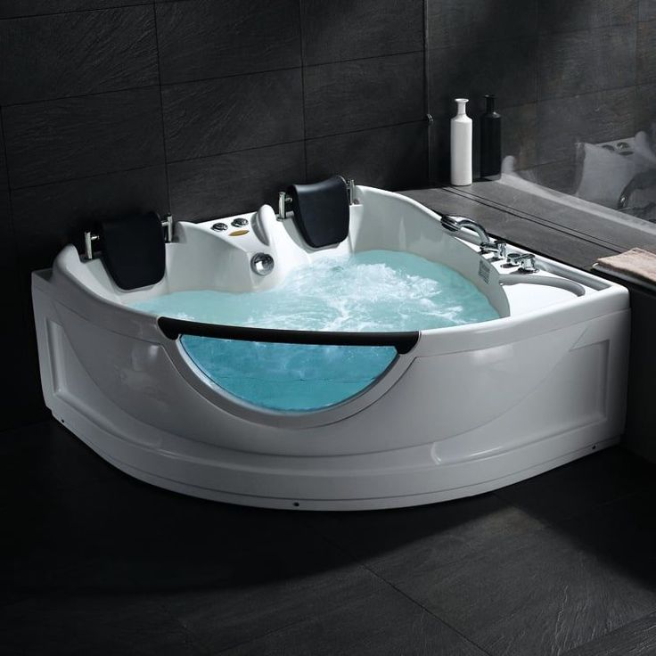 a bathroom with a large jacuzzi tub in it