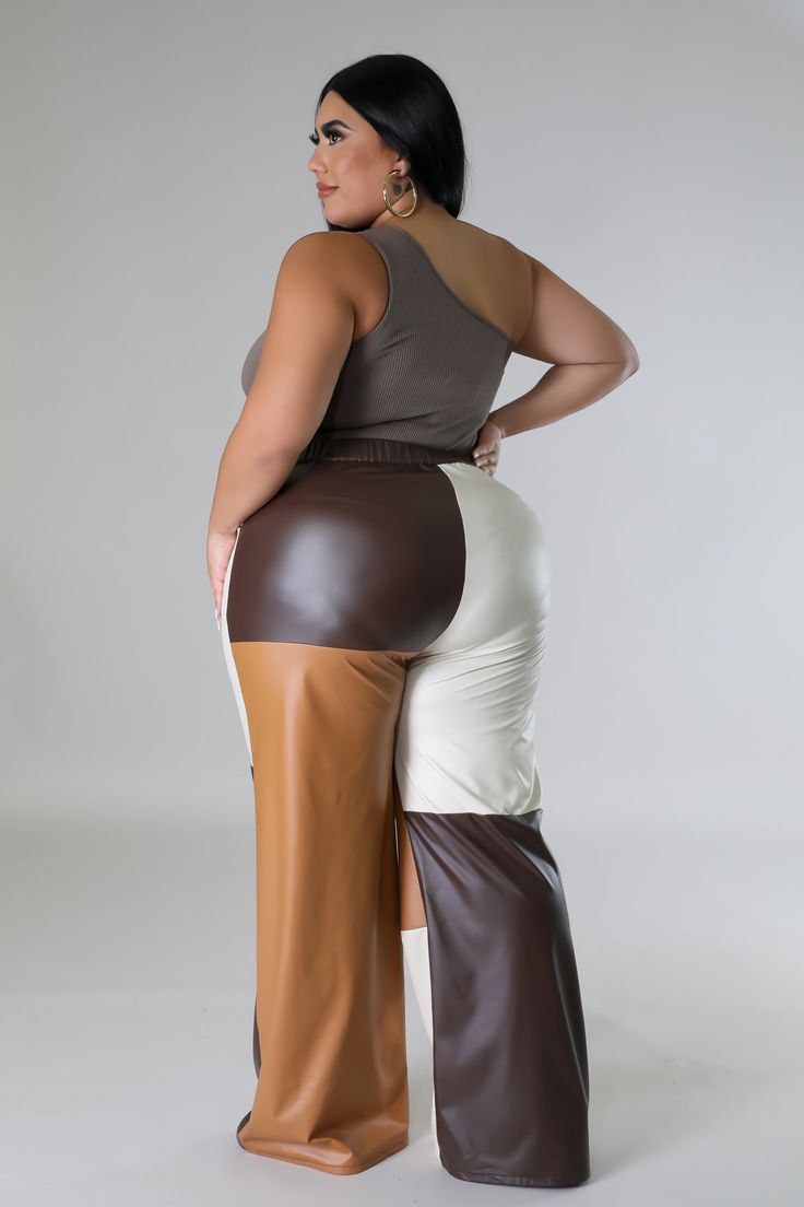 Stretch Wide Leg Faux Leather Pants, High Waist Faux Leather Pants, Trendy Brown Bottoms With Zipper Closure, High Waist Stretch Faux Leather Bottoms, Stretch Brown Faux Leather Bottoms, Stretch Faux Leather Brown Bottoms, Brown Stretch Leather Bottoms, Brown Faux Leather Trousers, Faux Leather High-waisted Pants With Zipper Closure