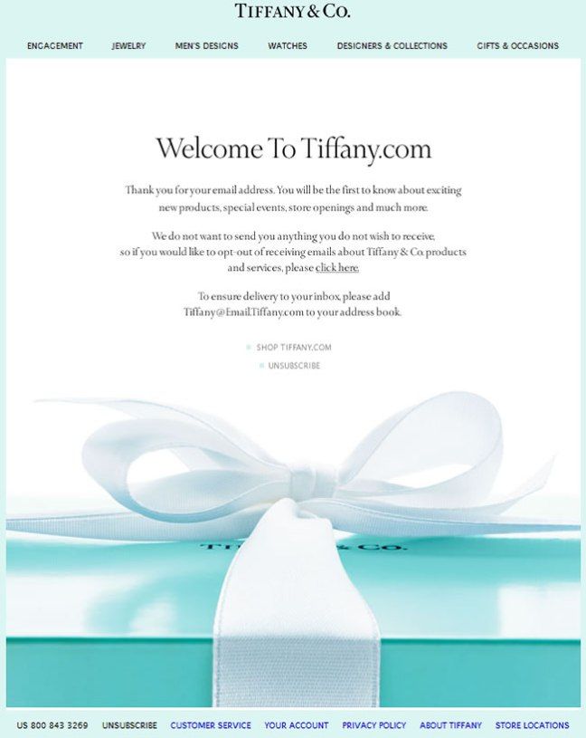 the tiffany & co website homepage is displayed with a white ribbon and bow on it