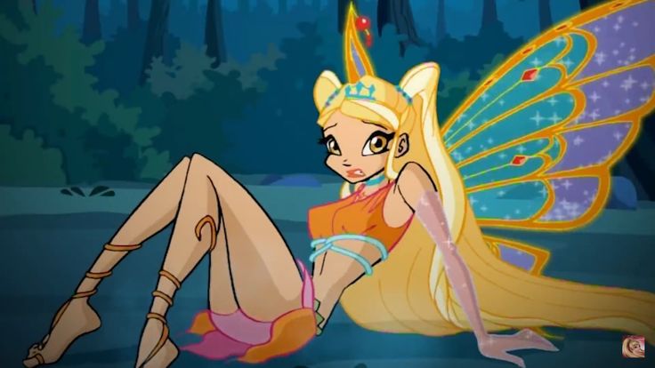 a fairy sitting on the ground with her legs crossed