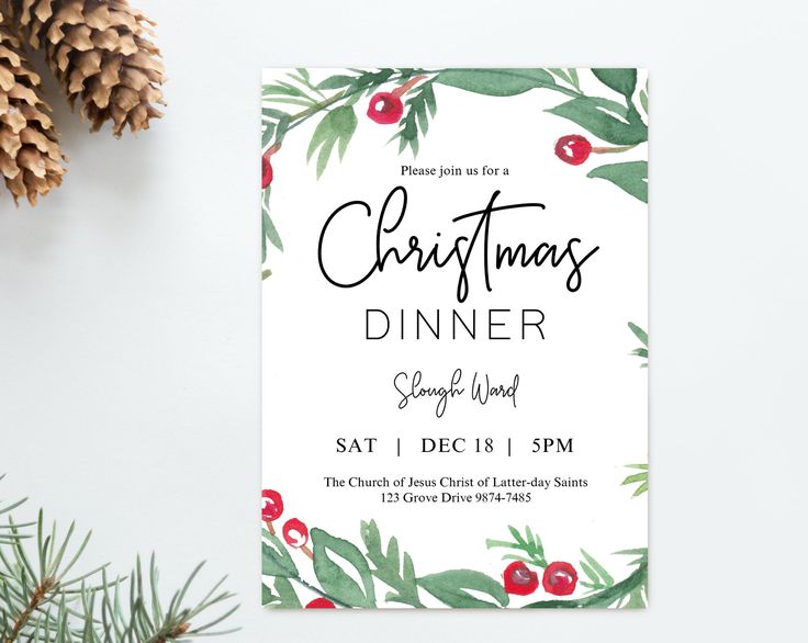 a christmas dinner party card with holly and berries on it, next to pine cones