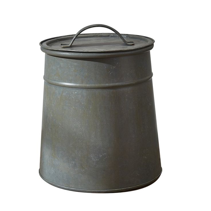 an old metal pot with handle on white background