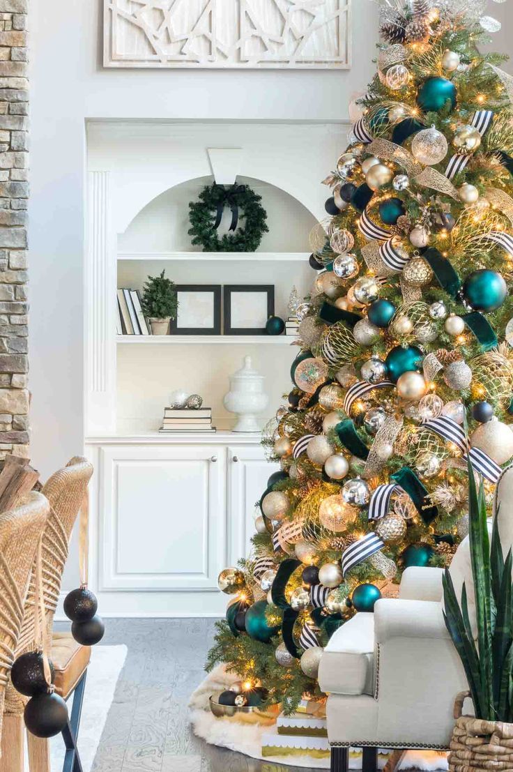 a christmas tree is decorated with blue and gold ornaments in this instagram ad for instagram