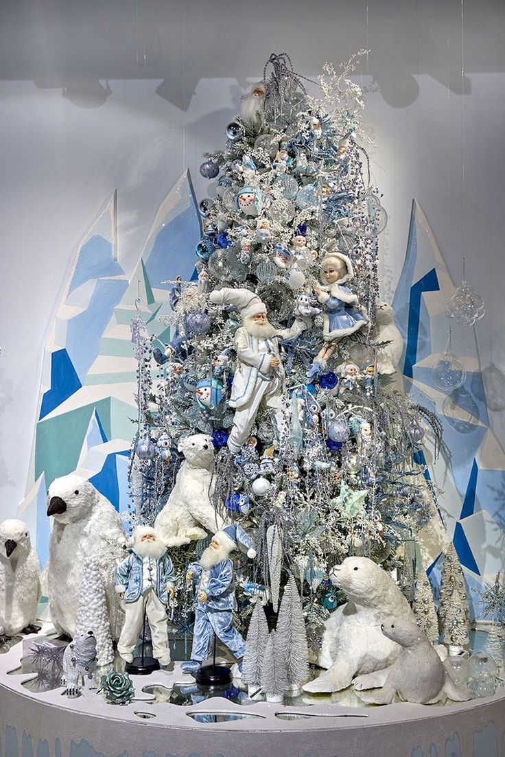 a christmas tree with polar bears and other decorations