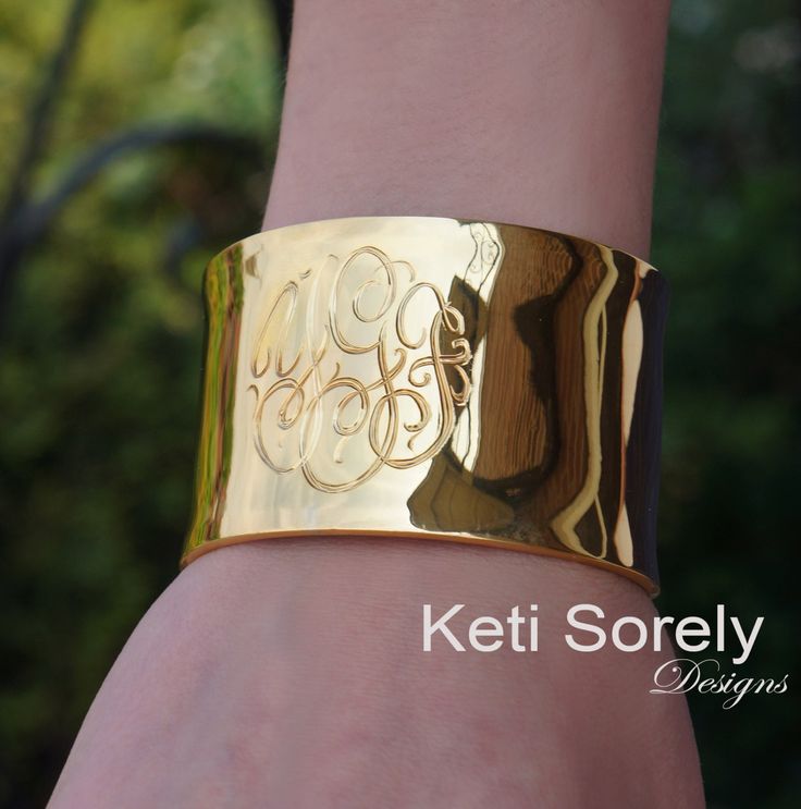 Personalized monogram bangle with hand engraved initials. Very stylish, unique gift for any women. Order in Sterling Silver, yellow gold or rose gold. Create elegant gift for woman of any age. Designs by: Keti Sorely. Metal options: - Sterling Silver - Sterling Silver with yellow gold overlay - Sterling Silver with Rose gold overlay Bracelet Width - 1.5" Engrave 1 to 3 initials. Bangle size: medium to large. One size fits all. ---------NOTE-------------- Traditional monograms are made with the f Engraved Rose Gold Cuff Bangle Bracelet, Engraved Rose Gold Bangle Cuff Bracelet, Engraved Rose Gold Cuff Bangle, Luxury Engraved Yellow Gold Cuff Bracelet, Adjustable Luxury Rose Gold Cuff Bracelet, Luxury Adjustable Rose Gold Cuff Bracelet, Elegant Engraved Cuff Bracelet As Personalized Gift, Elegant Engraved Cuff Bracelet For Personalized Gift, Engraved Rose Gold Bangle Bracelet