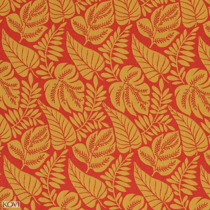 an orange and yellow pattern with leaves on it