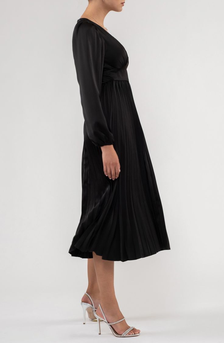 An empire waistline defines a satin long-sleeve midi dress with a pleated skirt for twirl-worthy appeal. 47" length (size Small) Back zip closure V-neck Long sleeves 94% polyester, 6% spandex Hand wash, dry flat Imported Model stats: 5'10" height, 32" bust, 25" waist, 36" hip. Model is wearing size Small. Midi Dres, Satin Long Sleeve, Empire Waistline, Long Balloons, Pleated Midi Dress, Satin Midi Dress, Sleeve Midi Dress, Wardrobe Inspiration, Long Sleeve Midi