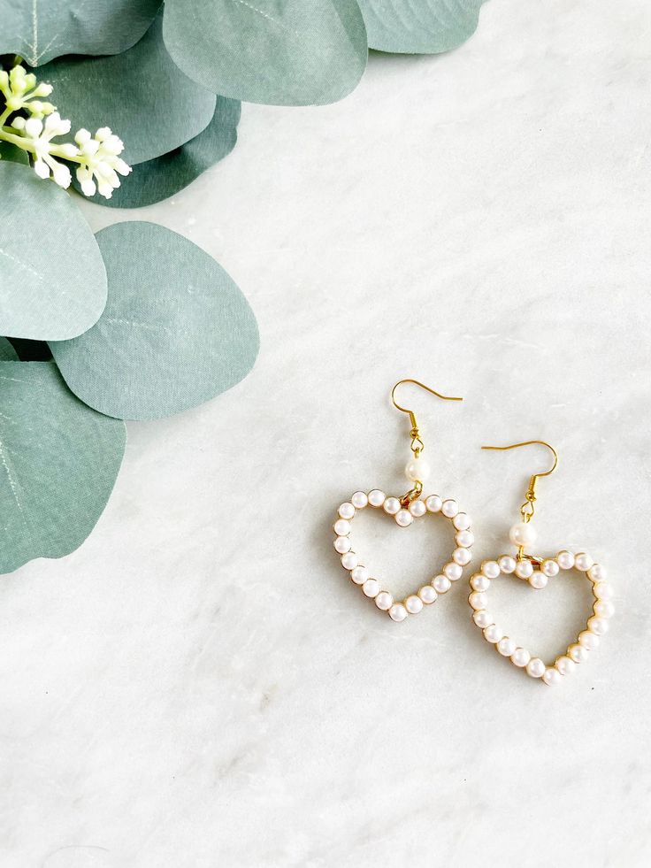 Ivory Pearl Heart Earrings. Pearl Heart Earrings. Heart Hoop - Etsy Valentine's Day White Pearl Earrings, White Heart-shaped Pearl Charm Earrings, White Heart-shaped Pearl Earrings For Valentine's Day, Valentine's Day Pearl Drop Dangle Earrings, Dainty Heart-shaped Pearl Drop Earrings, Elegant Wedding Hoop Earrings With Heart Charm, Elegant Hoop Earrings With Heart Charm For Weddings, Heart-shaped Pearl Earrings For Valentine's Day, Valentine's Day Pearl Party Earrings