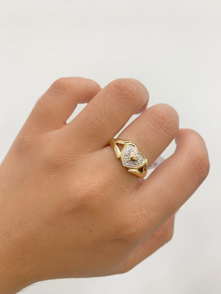 -14k Heart Ring  - 100% Gold  -Size 7  - Yellow gold  -Cubic zirconia  -Item sold by piece. Weight undetermined. Heart-shaped Yellow Gold Diamond Ring, Hallmarked Heart-shaped Diamond Ring, Vvs Clarity Diamond Heart Cut Ring, Diamond Heart Ring Hallmarked, Gold Diamond Ring Stamped 14k For Valentine's Day, 14k Heart Cut Diamond Ring For Valentine's Day, 14k Stamped Diamond Ring For Valentine's Day, Stamped 14k Diamond Ring For Valentine's Day, Valentine's Day Diamond Heart Ring, Hallmarked