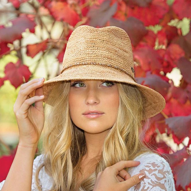 Malibu | Women's Sun Protection Hat – Wallaroo Hat Company Adjustable Crochet Hat For Travel, Gold Straw Brimmed Hat, Gold Panama Fedora Hat With Adjustable Fit, Adjustable Gold Fedora Panama Hat, Gold Adjustable Fedora Panama Hat, Gold Brimmed Straw Hat, Gold Fedora Straw Hat For Vacation, Gold Fedora With Curved Brim For Summer, Gold Fedora With Curved Brim For Beach