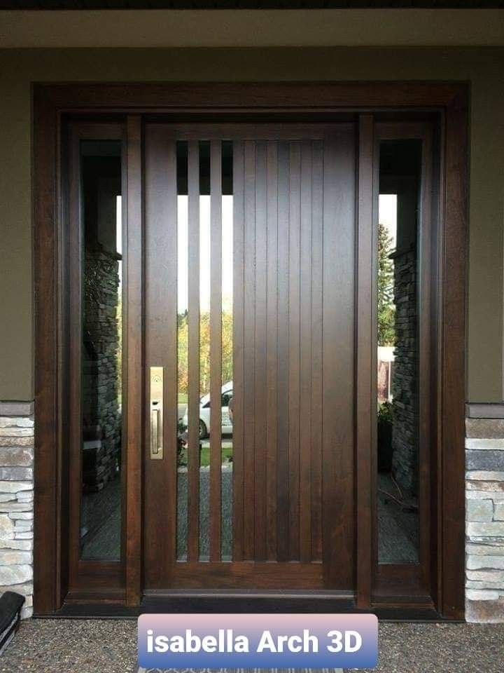 a modern wooden door with glass panels and sidelights on the front of a house