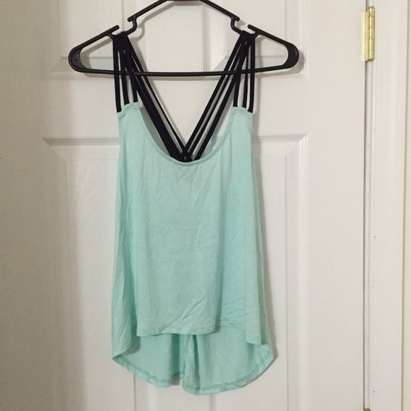 Criss cross top Mint top with black straps that cross in the back. Never worn. Perfect condition. Charlotte Russe Tops Tank Tops Mint Top, Criss Cross Top, Cross Top, Charlotte Russe, Criss Cross, Tank Top Fashion, Black Blue, Mint, The Back