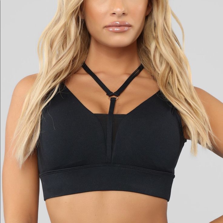 Fashion Nova Black Strappy Sports Bra. This Sports Bra Is Really Supportive And True To Size. Looks Great On And Not Uncomfortable At All. Brand New!! Black Sporty T-back Activewear, Casual Black T-back Activewear, Black Tank Top For Yoga With Bust Support, Black Tank Top With Bust Support For Yoga, Black Tank Top With Medium Bust Support For Yoga, Black Bra-friendly Crop Top For Workout, Strappy Athleisure Workout Tops, Bra Friendly Black Crop Top For Workout, Supportive Black Crop Top For Workout