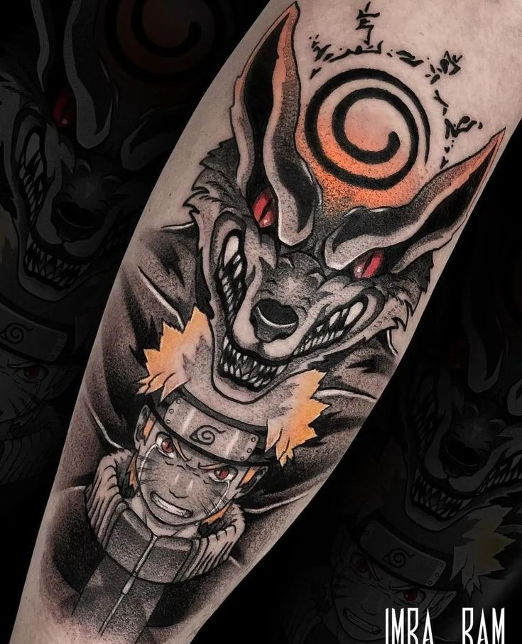 a tattoo with an image of a demon and a cat on it's arm