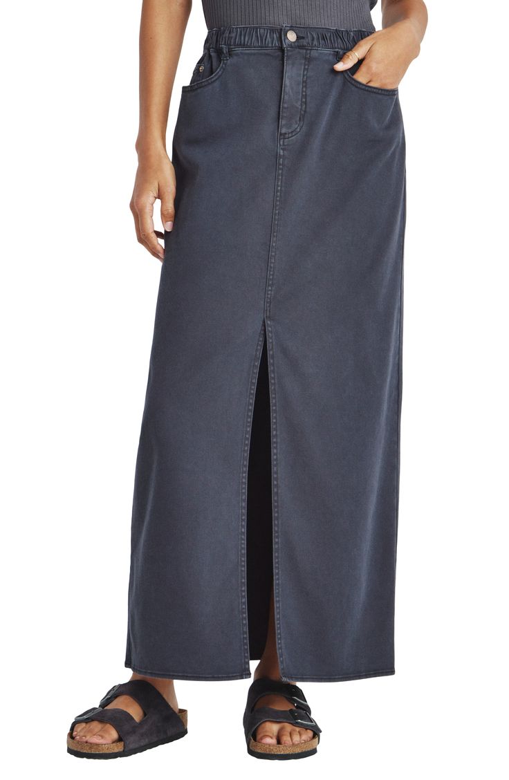 Move comfortably through your day in a soft stretch-denim maxi skirt constructed with an elastic waist and movement-easing front vent. 37 1/2" length Elastic waist; zip fly with button closure Five-pocket style 61% cotton, 37% modal, 2% spandex Machine wash, tumble dry Imported Denim Blue Full-length Maxi Skirt, Full Length Denim Blue Maxi Skirt, Casual Full Length Denim Blue Maxi Skirt, Denim Blue Casual Maxi Skirt, Casual Denim Blue Maxi Skirt, Casual High Waist Skirt With Side Slits, Versatile Full Length Lined Skirt Bottoms, Casual High Rise Dark Wash Maxi Skirt, Dark Wash High Rise Casual Maxi Skirt