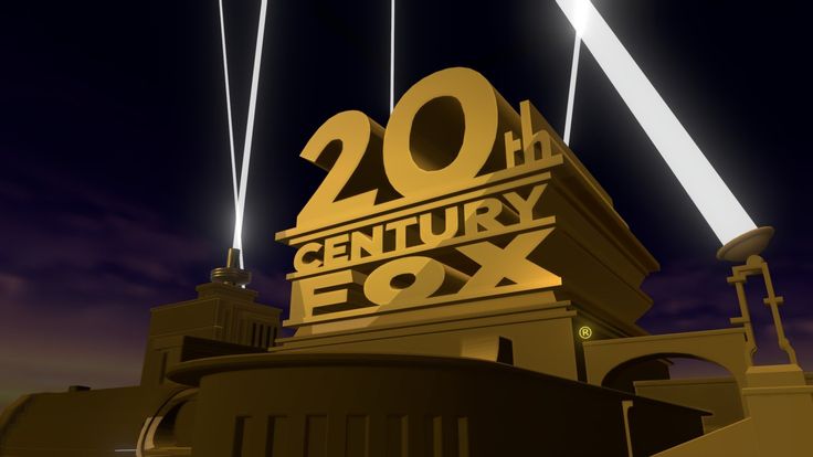 the 20th century exx sign is lit up at night with two lights above it