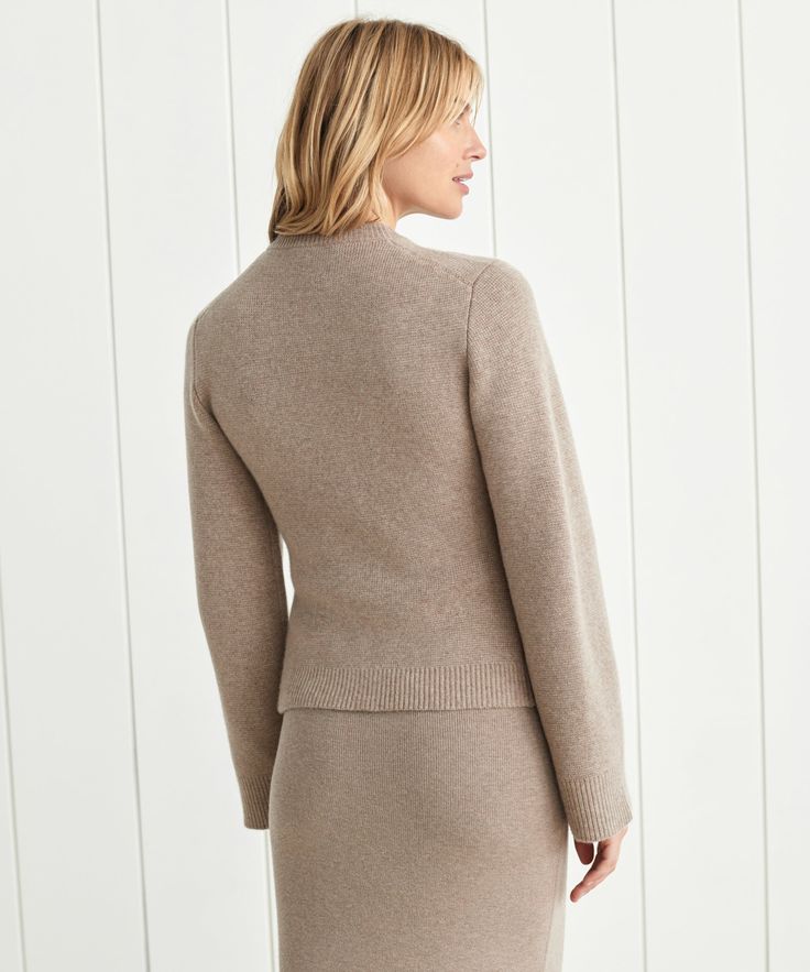 Cooper Cardigan Taupe Featuring a structured hourglass silhouette and a very slight bell sleeve, this chic knit is unlike anything we’ve done before. Ultra-soft wool cashmere and a classic shape are easily styled with everything from wide-leg trousers to your favorite skirt. 70% wool, 30% cashmere. Made in China of Peruvian yarn. Fitted button-down cardigan. Elegant Long Sleeve Merino Wool V-neck Sweater, Elegant Cashmere V-neck Sweater For Work, Elegant Fine Knit Cashmere V-neck Sweater, Fitted Cashmere V-neck Sweater For Work, Elegant Wool Sweater For Workwear, Elegant Merino Wool V-neck Sweater For Fall, Elegant V-neck Cashmere Cardigan, Elegant Cashmere Sweater For Work, Timeless Wool Sweater For Fall