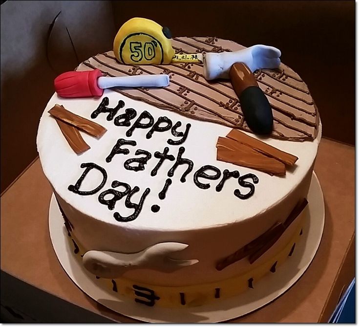 a birthday cake with the words happy fathers day written on it