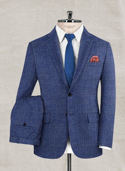 Introduce your styling rotation with some courageous refinement like our Italian Murano Cobalt Blue Wool suit. Crafted from wool linen silk blend, the naturally breathable suit features a decent texture along with the cobalt blue hue that makes for an outstanding menswear piece needed in every gent’s closet. 
 
 Look features a 2 button jacket with notch lapels, real horn royal buttons, single vent, three cuff buttons and two welted back pockets on trousers. 
 You can change the look during cust Blue Suits With Pockets For Business Casual, Blue Business Casual Suit With Pockets, Fitted Blue Linen Blazer, Classic Blue Linen Suits, Classic Blue Linen Suit, Tailored Blue Wool Suit, Blue Fitted Linen Suit, Fitted Blue Linen Suit, Semi-formal Blue Linen Suits