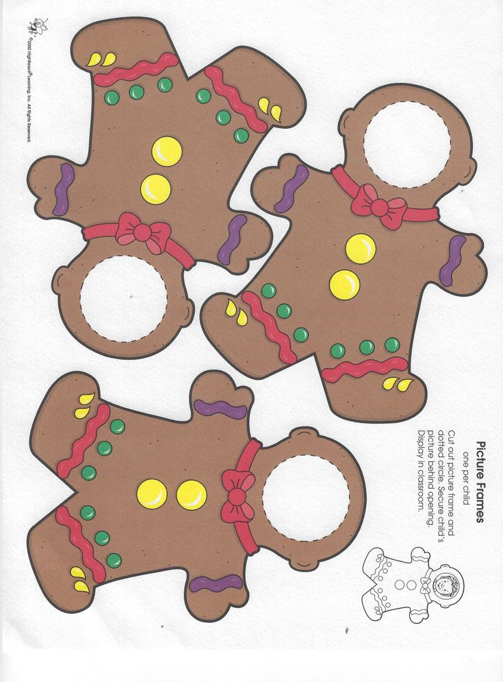 four gingerbread cookies cut out on top of each other