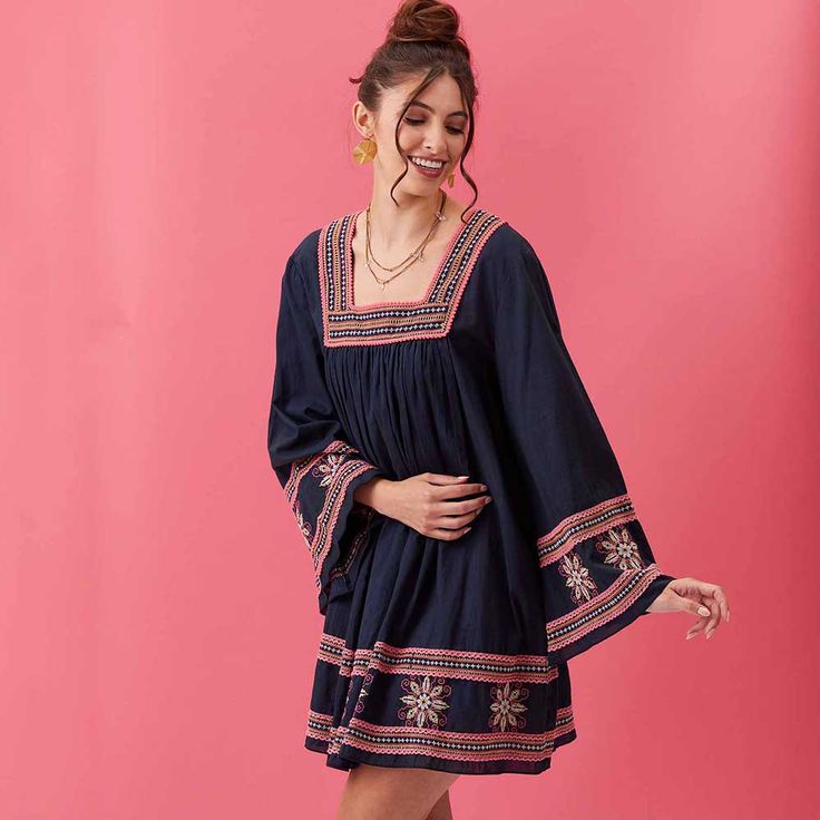 Sometimes you just want to throw on something effortless and casual without skimping on style. Enter the Tess Embroidered Dress! There's two features of this dress that make it the perfect wardrobe piece for conveying effortlessly chic style. The first is the fun yet sophisticated pink embroidery on the square neckline, sleeves and hem that pops against the super soft indigo blue denim. The second is the playful flowy fit that provides comfort while still being feminine and flattering. Sheer per Embroidered Cotton Dress For Day Out, Embroidered Mini Dress For Vacation, Chic Embroidered Mini Dress For Beach, Cotton Dress With Embroidered Hem For Fall, Cotton Fall Dress With Embroidered Hem, Fall Cotton Dress With Embroidered Hem, Chic Embroidered Cotton Mini Dress, Chic Embroidered Dresses For Day Out, Casual Embroidered Midi Dress For Day Out