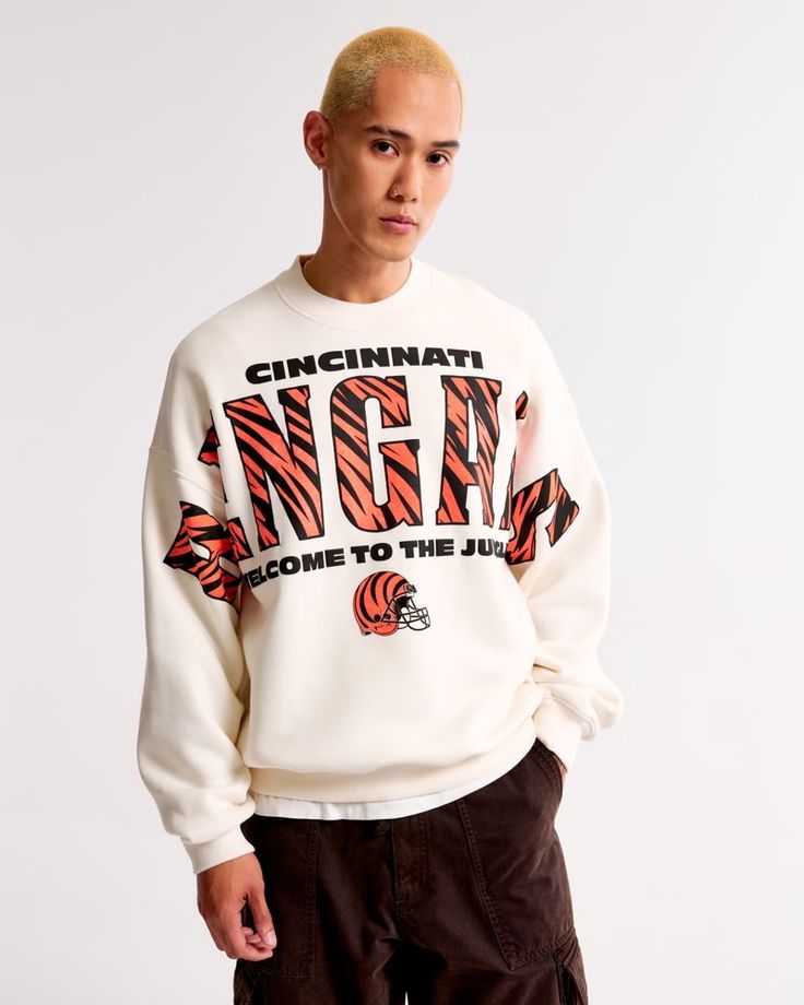 NFL Cincinnati Bengals Graphic Crew Sweatshirt | NFL NFL | Abercrombie.com Male Features, Colorful Sweatshirt, Classic Sweatshirt, Men's Tops, Carolina Panthers, Cincinnati Bengals, Die Hard, Crew Sweatshirts, Philadelphia Eagles