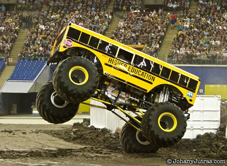 a monster truck is jumping in the air