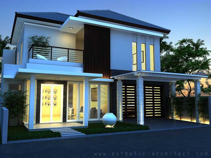 this is an artist's rendering of a modern house in the evening with lights on