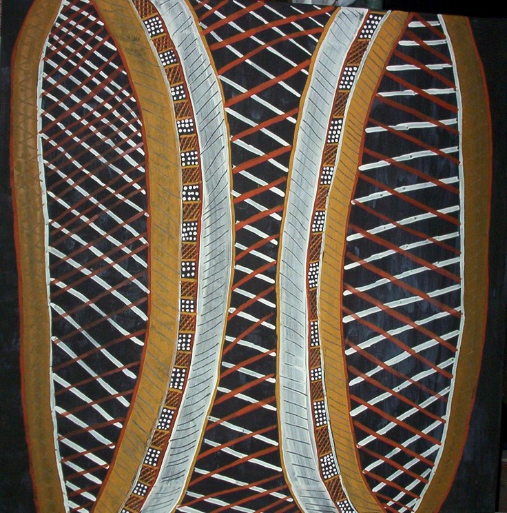 an art piece is shown with lines and dots on the fabric, as if it were woven