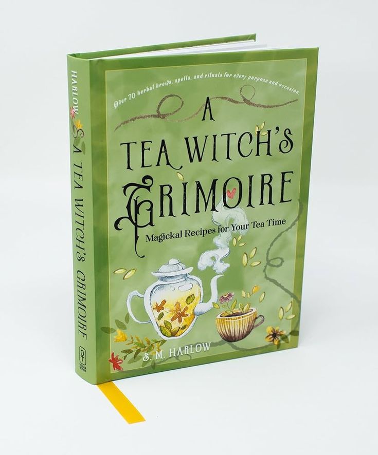 a green book with an image of a tea pot