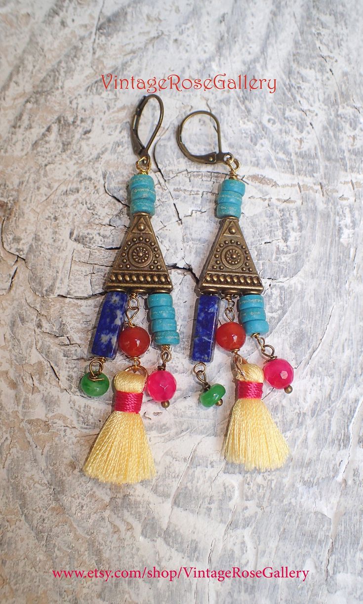 "Colourful Mexican Aztec Earrings, Colourful Bohemian Earrings, Boho Artistic Earrings, Chandelier Earrings A bohemian pair of chandelier earrings inspired by the Mexican and Aztec Jewellery Features : lapis lazuli gemstones, carnelian gemstones , jade , turquoise gemstones , small silk tassels antique bronze findings with mexican style , and antique bronze lever backs . The most interesting , joyful, impressive, artistic and colourful earrings Measures approx. 2 1/2 \" - 7 cm in length. 🌹Selec Bohemian Dangle Earrings For Jewelry Making, Bohemian Earrings With Latkans, Artistic Dangle Jewelry For Festivals, Multicolor Brass Beaded Earrings For Festival, Bohemian Multicolor Brass Earrings, Adjustable Multicolor Brass Earrings, Bohemian Tassel Earrings As Gift, Bohemian Dangle Earrings With Latkans, Festival Tassel Dangle Earrings