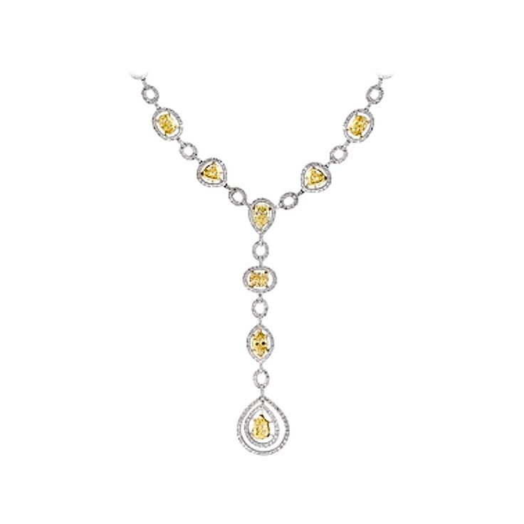 This is one of the premium necklaces in our Bridal collection that is sure to impress. It features 8 solitaire pieces of yellow diamonds that weigh approximately 10 carats, all mounted in 18 karat gold. The yellow diamonds come in different shapes and sizes, which adds to the uniqueness of the necklace. In addition to the yellow diamonds, the necklace also has approximately 4 carats of small round cut diamonds that surround them. These white diamonds add to the overall beauty and elegance of the Luxury Diamond Drop Necklaces, Luxury Diamond Bridal Necklace With Gemstone, Luxury Drop Diamond Necklaces, Luxury Bridal Necklace With Diamond Gemstone, Exquisite Diamond Necklace Hallmarked, Luxury Oval Necklace With Rose Cut Diamonds, Luxury Oval Rose Cut Diamond Necklaces, Luxury White Gold Necklaces With Rose Cut Diamonds, Formal Hallmarked Pear-shaped Necklace