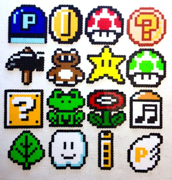 a bunch of different types of nintendo stickers on a white surface with the letter p