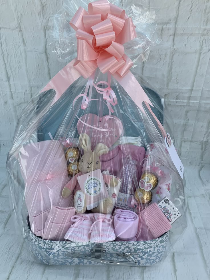 a basket filled with lots of pink items