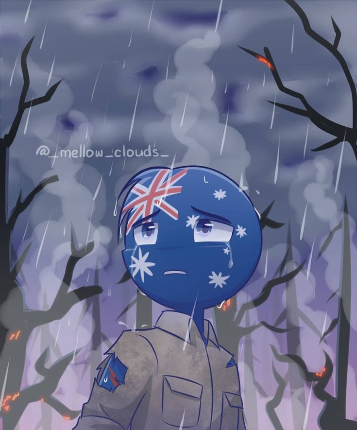 a person with an australian flag painted on their face standing in front of some trees