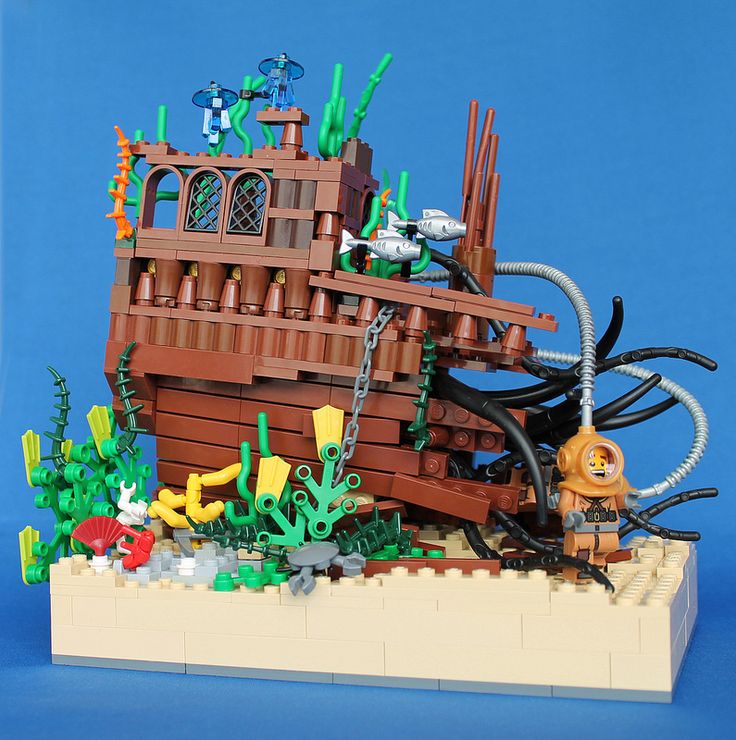 a lego model of a pirate ship with octopuses and other sea creatures on it