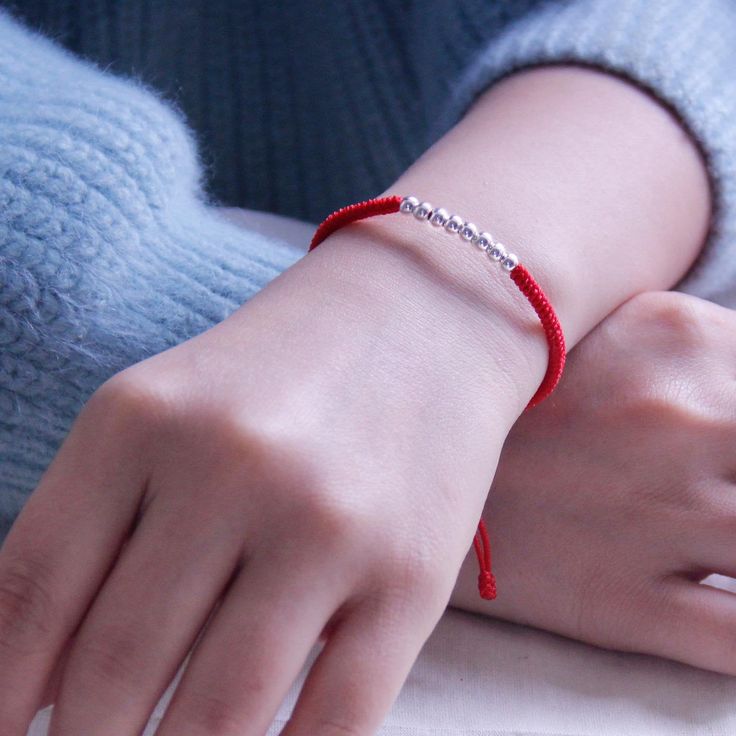 🍀 100% handmade 🍀 Materials ：4mm 925silver & string 🍀 personalized：【yes 】➜Please feel free to contact me. 🍀 colors：Black & Red【other colors are available】➜ Just give messages and tell me which color do you like. 🍀 length：【length is adjustable and can be made as you want】➜You can just tell me what is the perfect length you like. 🍀 processing time： 1-2 workdays all my products are here: https://www.etsy.com/shop/JoanaAbby?ref=seller-platform-mcnav Minimalist Silver Resizable Friendship Bracelet, Silver Friendship Bracelets With Silver Beads, Silver Friendship Bracelets For Valentine's Day, Silver Sterling Silver Friendship Bracelets For Everyday, Minimalist Silver Friendship Bracelets, Personalized Silver Friendship Bracelets Gift, Personalized Silver Friendship Bracelets For Gift, Sterling Silver Beaded Bracelets For Friendship, Handmade Sterling Silver Braided Friendship Bracelets