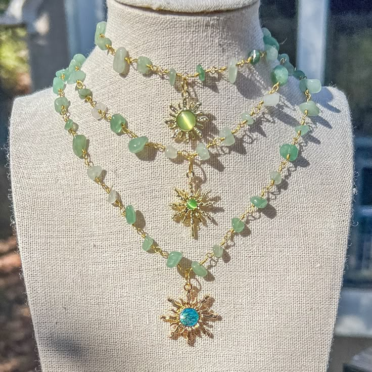 "Sun Green Aventurine Crystal Necklace/Gemstone Choker/Hippie Boho Crystal Jewelry/Wire Wrapped Crystal Necklace w/sun Charms/Handmade/Gift - Choker style crystal necklace with Green Aventurine Crystal Chip Beads and sun charm - Length is 15\",16\", 17\", 18\" and 19\"  - Materials: Gold plated copper wire, natural Green Aventurine crystals and, brass charms Check other styles in my shop: https://www.etsy.com/listing/1495642204/carnelian-sun-charm-wire-wrapped-gold?click_key=767e5654fd339a2ab4b9 Handmade Dangle Crystal Necklaces, Hand Made Hippie Jewelry, Affordable Beaded Festival Choker, Handmade Cheap Necklaces For Festivals, Affordable Green Bohemian Necklace, Cheap Whimsical Beaded Jewelry, Cheap Themed Necklaces For Jewelry Making, Cheap Handmade Crystal Choker Necklace, Cheap Handmade Festival Choker