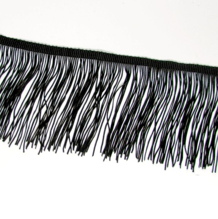 a close up of a black fringe on a white background